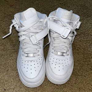 Nike high-top Air Force ones. Women’s size 6.5. Barely worn, practically new.